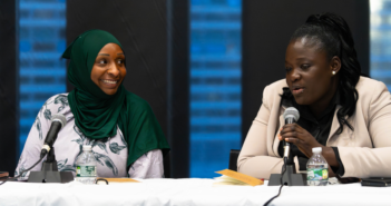 panelist Marthe Kiemde (right) speaks whiile co-panelist Adama Bah (left) watches on and smiles.