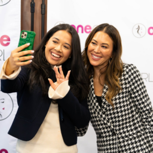 Speakers at last year's Women in Charge event pose for a selfie.