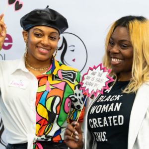 Attendees at last year's Women in Charge event pose for a photo.