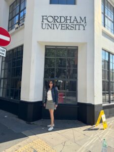 pam gawley stands outside the fordham london campus