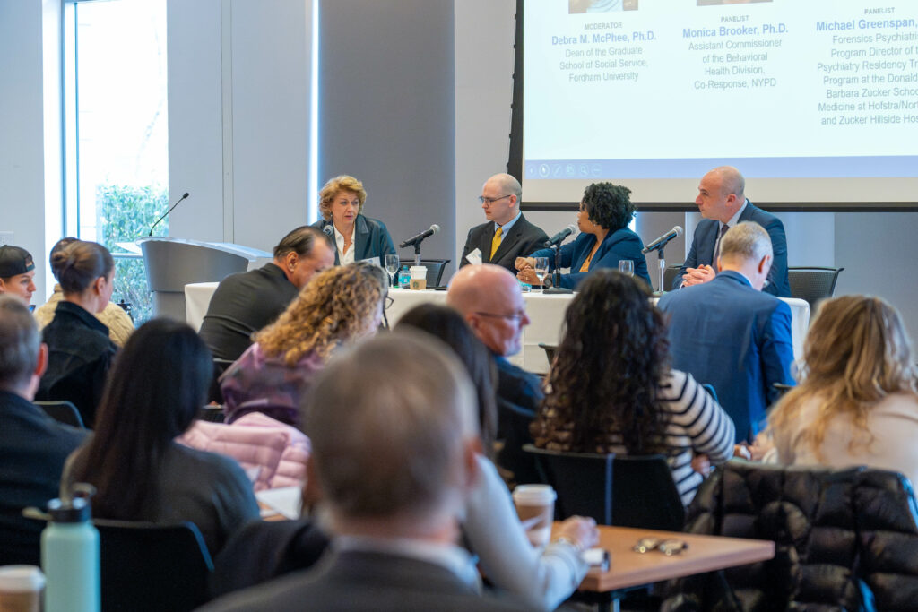 From left to right: Fordham GSS Dean Debra M. McPhee, Ph.D.; Lieutenant Sean Walker, Operations Coordinator at the Interagency Operations Bureau, NYPD; Monica Booker, Assistant Commissioner of the Behavioral Health Division, Co-Response, NYPD; Michel Greenspan, M.D., Forensics Psychiatrist and Program Director of the Psychiatry Residency Training Program at the Donald and Barbara Zucker School of Medicine at Hofstra/Northwell and Zucker Hillside Hospital