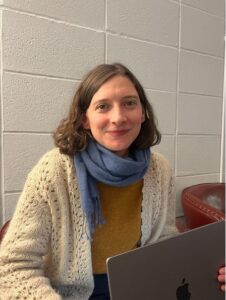 fordham msw student maggie sits in the GSS student lounge